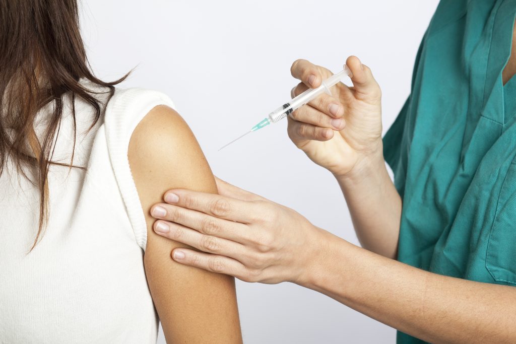 flu shot side effect sore arm treatment